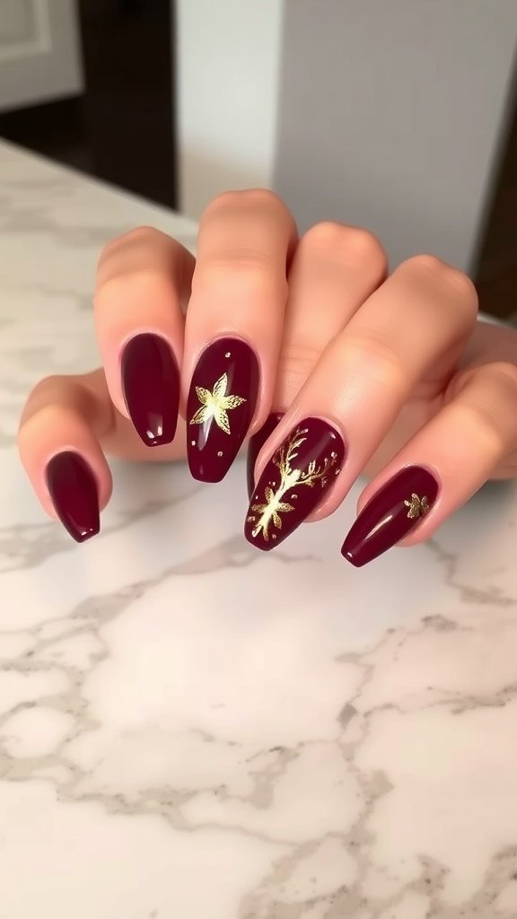 Cherry wine nails with gold foil accents