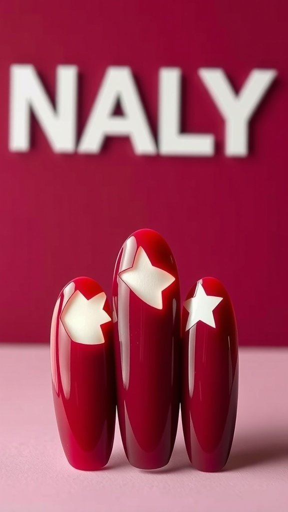 Cherry wine nail design featuring cut-out shapes of stars and arrows.