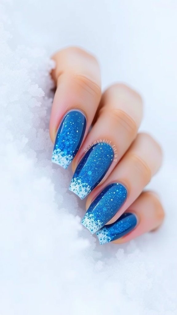 Frosty blue ombre glitter nails with a snowy background