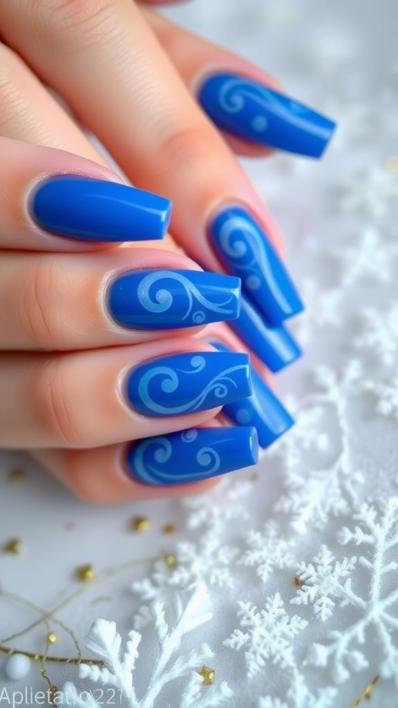 Sapphire blue nails with swirls on a snowy background