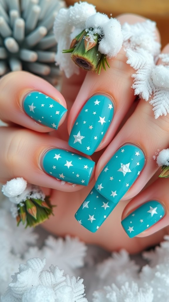 Vibrant teal nails with star patterns, surrounded by snow and pine decorations.